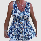 Soft breathable sleeveless top, blue-and-white abstract print, V-neck, gathered bust