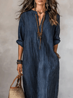 Blue indigo loose-fit maxi dress neckline detail with V-front and vertical striped fabric