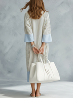 Blue and white vertical striped midi dress with three-quarter flared sleeves