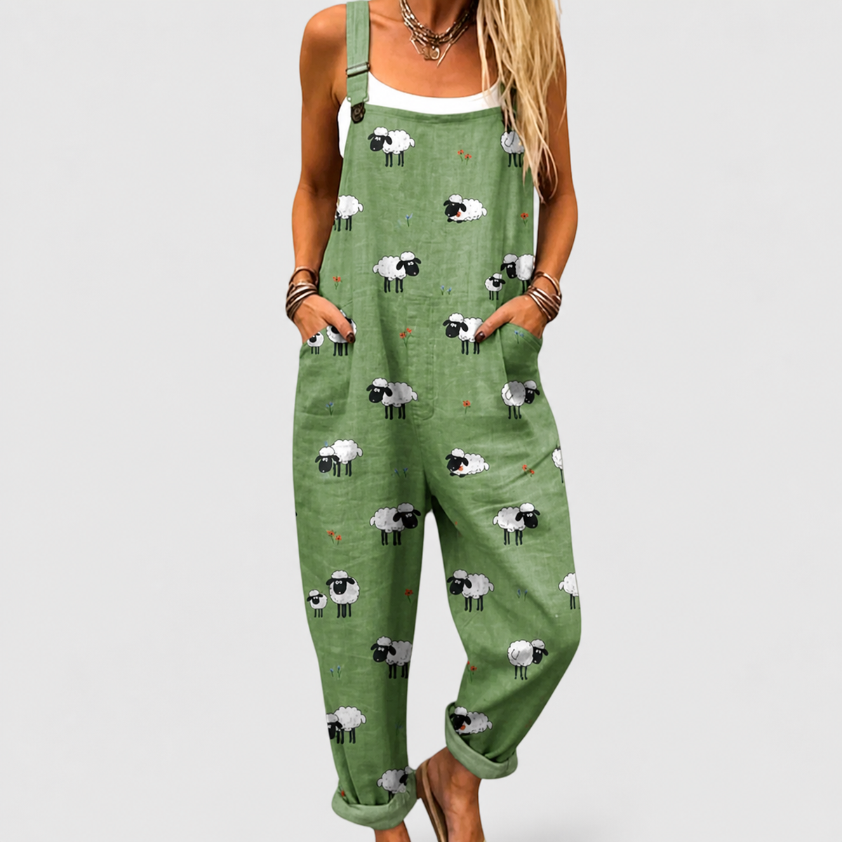 Green sleeveless jumpsuit with allover sheep print, wide legs