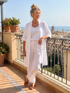 Elegant set with long short-sleeve shirt and wide-leg pants, white
