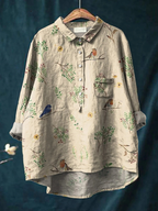 Light beige women’s casual shirt with button placket, patch pocket, and bird & floral print