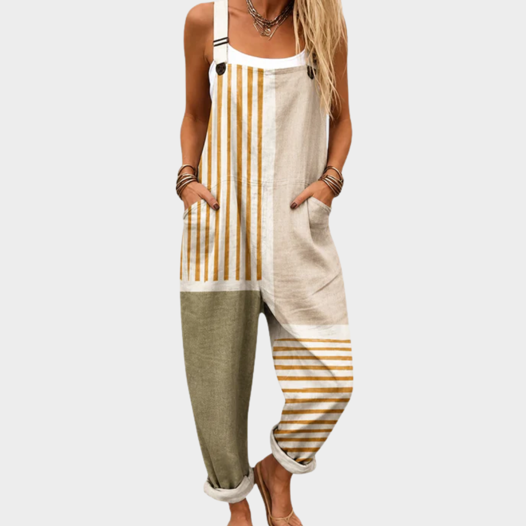 Beige striped sleeveless jumpsuit with wide straps, front pocket, and relaxed fit legs