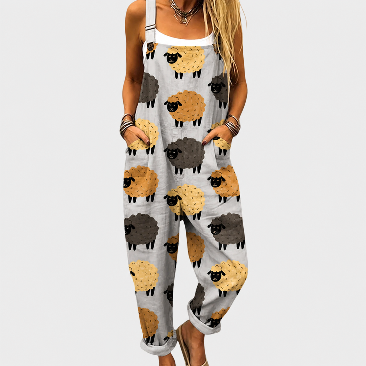 Printed overalls with sheep faces pattern, adjustable straps, front bib and pockets