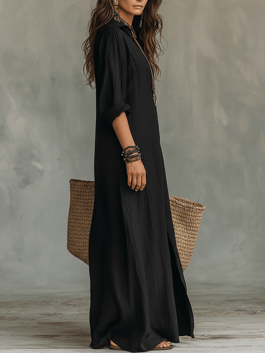 Black bohemian maxi shirt dress with button placket and elbow-length sleeves.