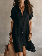 Black linen relaxed midi dress with short sleeves, V-neck, and button front detail