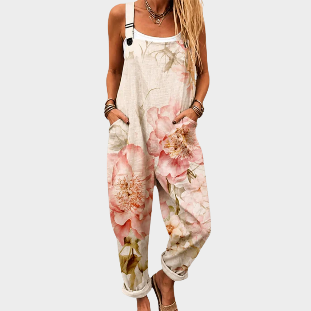 Beige floral printed sleeveless overalls with adjustable straps and front pockets