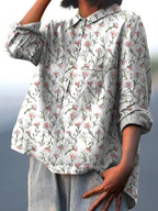 Women's floral button-up shirt, light gray with pink flowers and green stems, front pocket