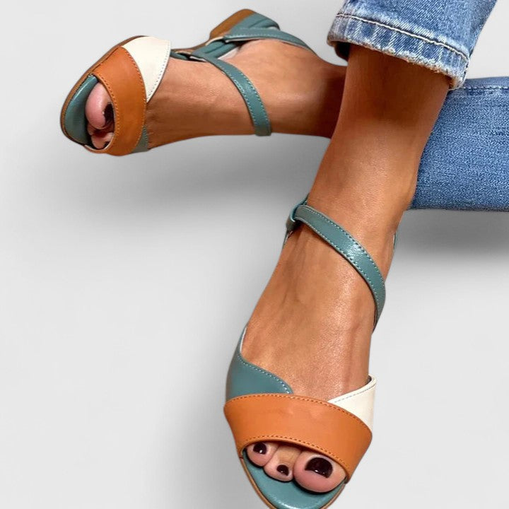 Color-block open-toe sandals with ankle strap and decorative toe detail, teal and tan