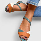 Color-block open-toe sandals with ankle strap and decorative toe detail, teal and tan