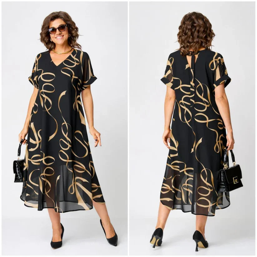 Women's black midi dress back view with gold swirl print and keyhole opening