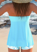 Light blue pleated tankini top with bandeau back and patterned hem