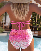 Printed two-piece bikini set with pink tie-back and pink floral briefs