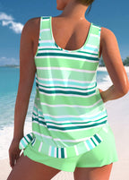 Light green striped tankini set with open-back sleeveless top and matching swim shorts