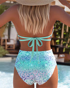 Printed two-piece bikini set with turquoise tie-back and aqua floral briefs