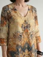 Floral V-neck midi dress with paisley medallion print and elbow-length sleeves