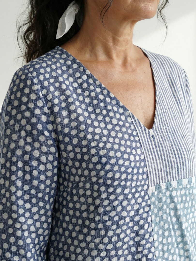 Blue patchwork V-neck midi dress with 3/4 sleeve, dotted and striped panels
