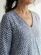 Blue patchwork V-neck midi dress with 3/4 sleeve, dotted and striped panels