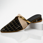 Black gator-pattern slip-on mule with beige fabric strap and gold bar accent