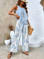 Sky blue floral two-piece set with sleeveless top and flowy wide-leg pants