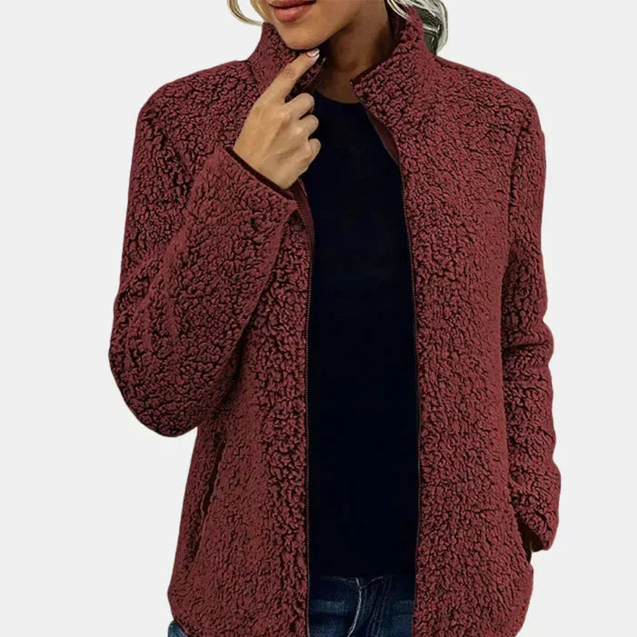 Burgundy teddy fleece zip-up jacket on model, stand collar and front zip