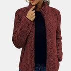 Burgundy teddy fleece zip-up jacket on model, stand collar and front zip