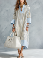 Blue and white striped midi dress with V-neck and flared light-blue sleeves