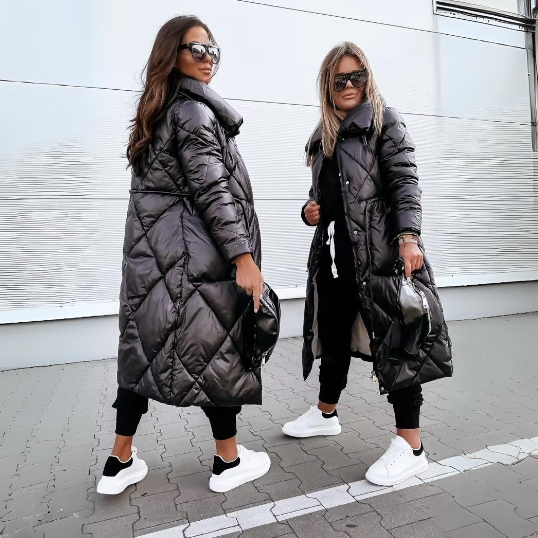 Black quilted long puffer coat with hood, front zipper, side pockets.