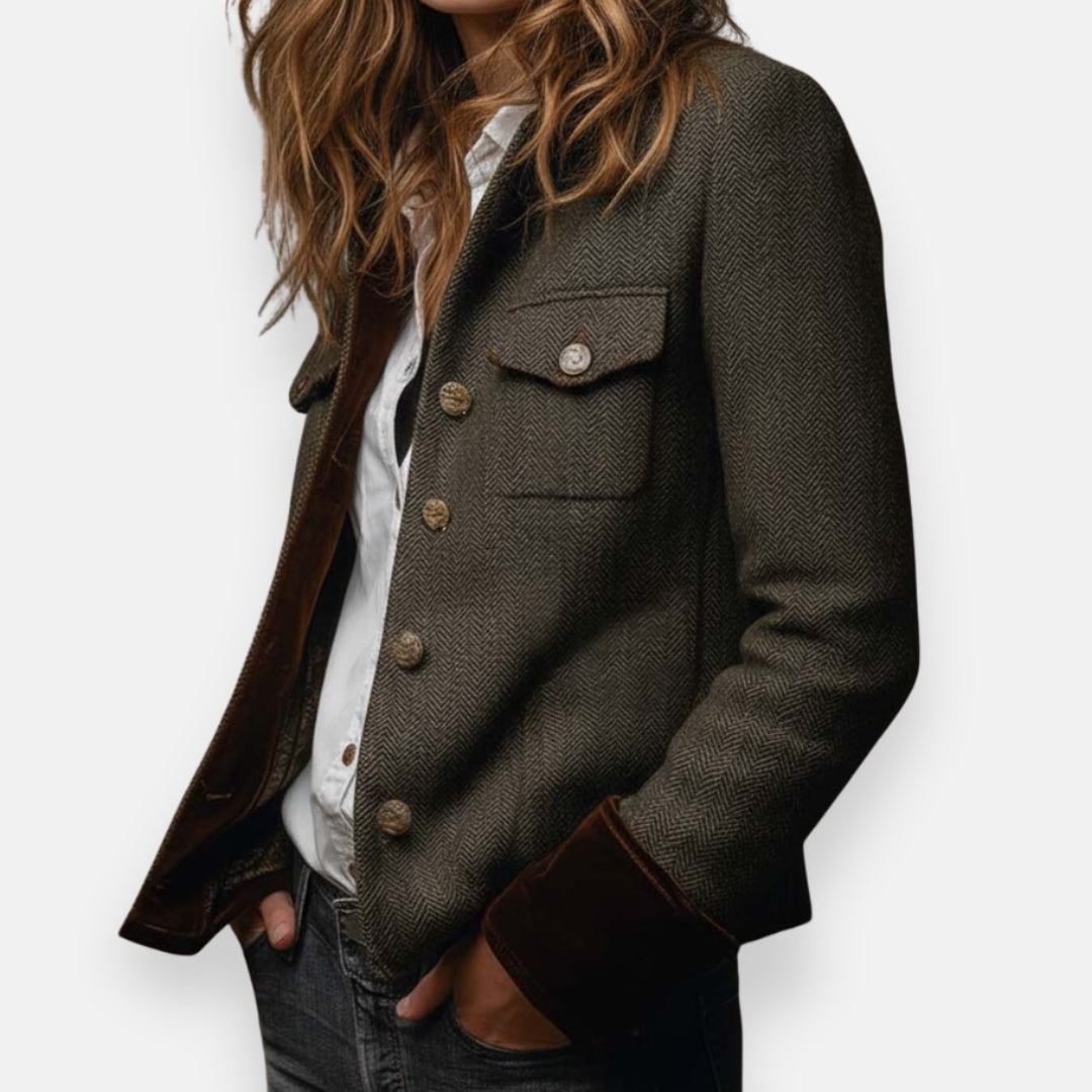 Olive tailored jacket with notch collar, gold buttons, chest pocket, and dark cuffs