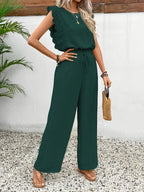 Dark green two-piece set with ruffled sleeveless top and tie-waist wide-leg pants