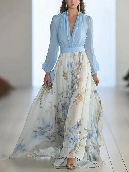 Light blue V-neck maxi dress with long sleeves and blue floral print skirt