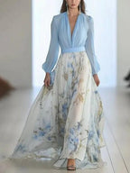 Light blue V-neck maxi dress with long sleeves and blue floral print skirt
