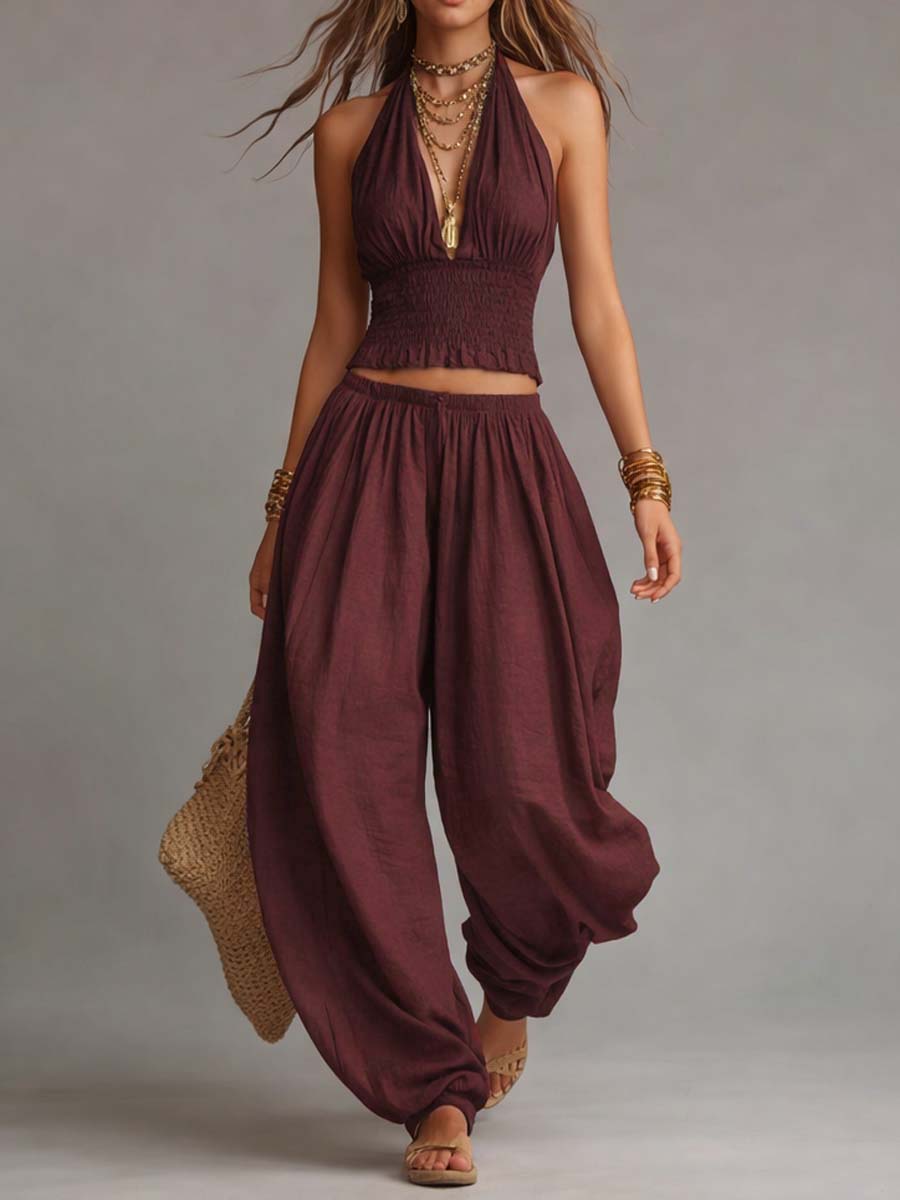 Burgundy halter two-piece set with fringe crop top and loose balloon pants, sleeveless