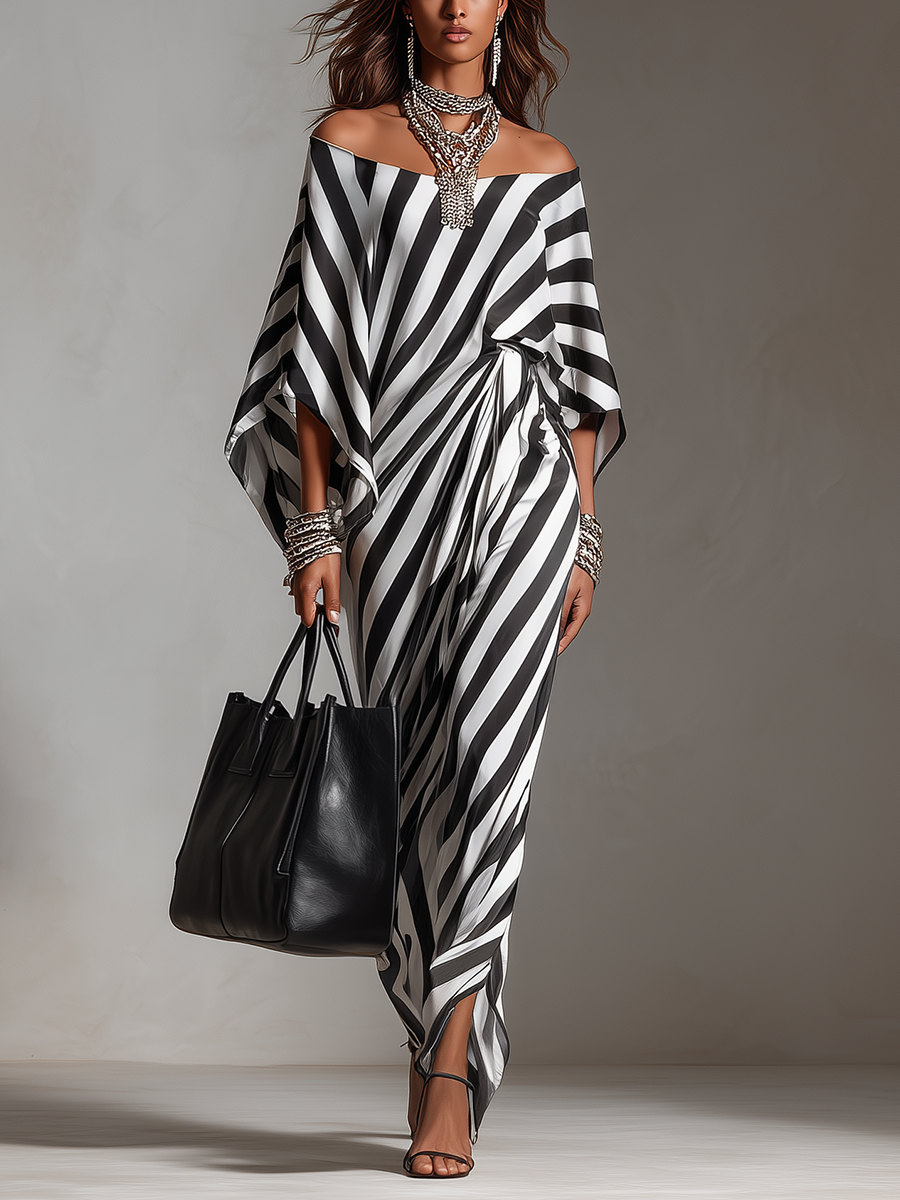 Black-and-white striped asymmetric maxi dress with off-shoulder neckline and draped sleeves