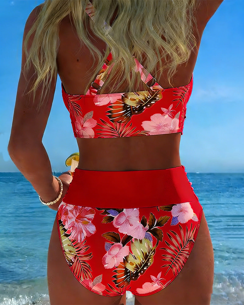 Floral contrast split bikini with red halter top and tropical floral high-waist bottoms