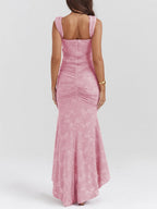 Pink floral maxi dress with scoop back, sleeveless ruched silhouette and flared hem