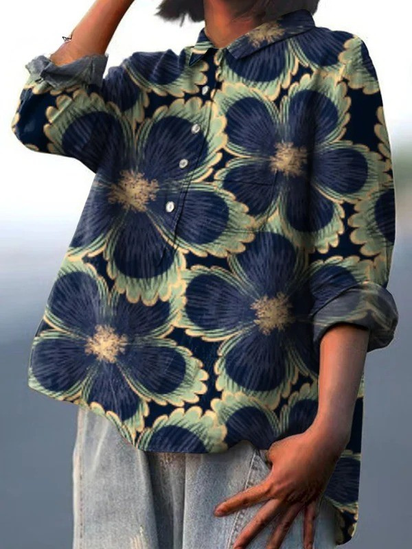 Women's vintage floral button-up shirt with navy and yellow blooms, relaxed side view
