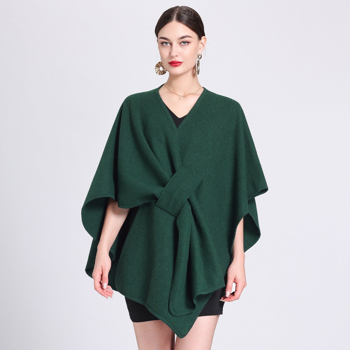 Forest green caped fleece shawl with V-neck and waist tie, flowing poncho shape.
