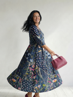 Blue floral midi dress, flared skirt and V-neck, three-quarter sleeves