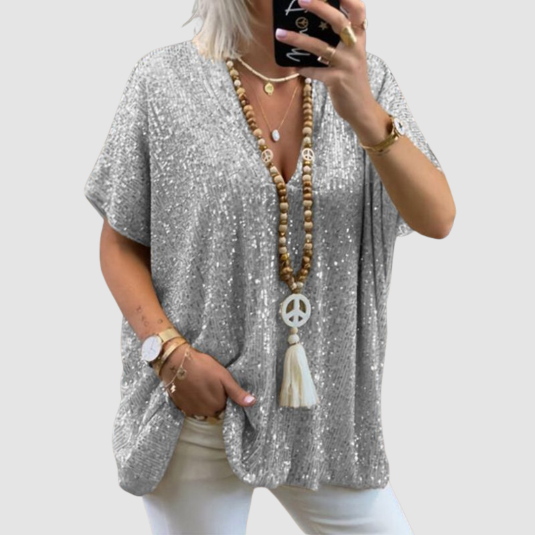 Silver sequin V-neck top with short sleeves and relaxed fit