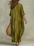 Olive green bohemian maxi dress, relaxed back view, loose draped silhouette