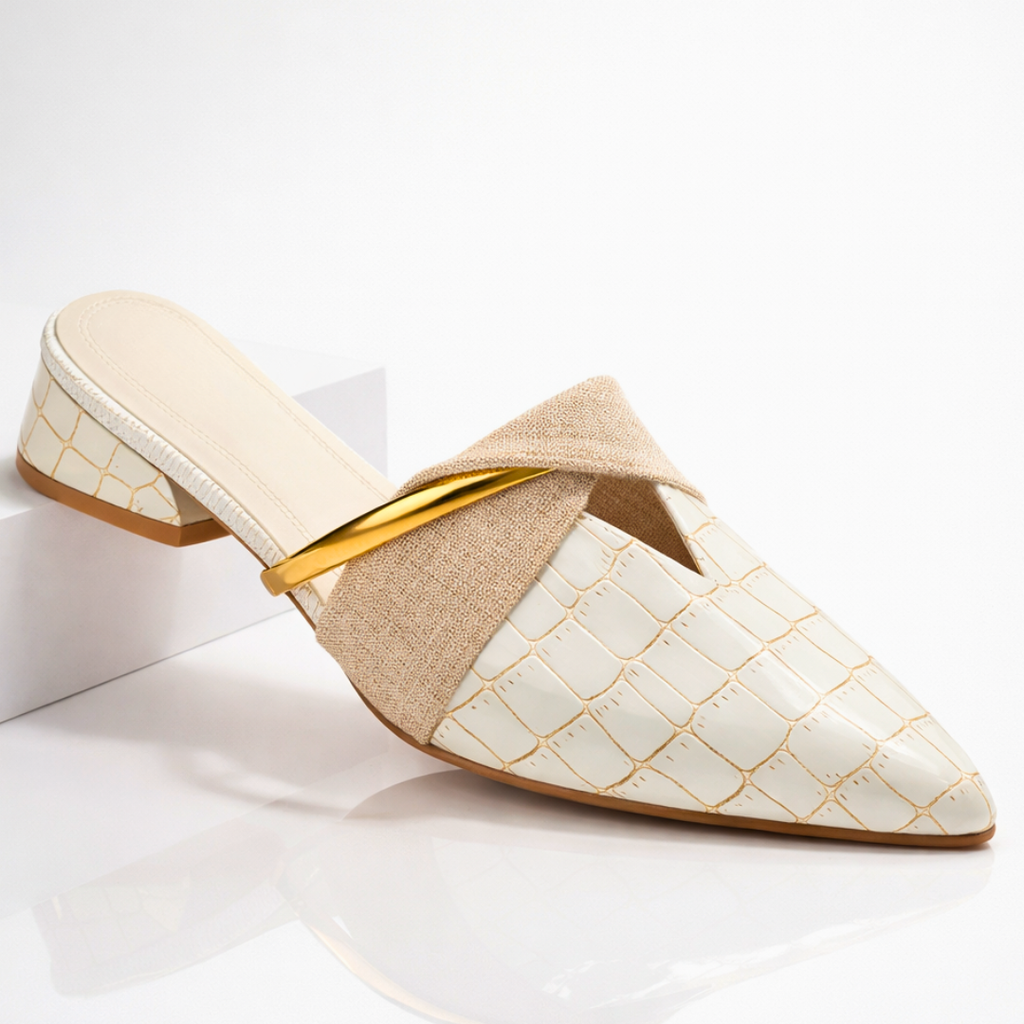 Cream gator-pattern slip-on mule with beige fabric strap and gold bar accent