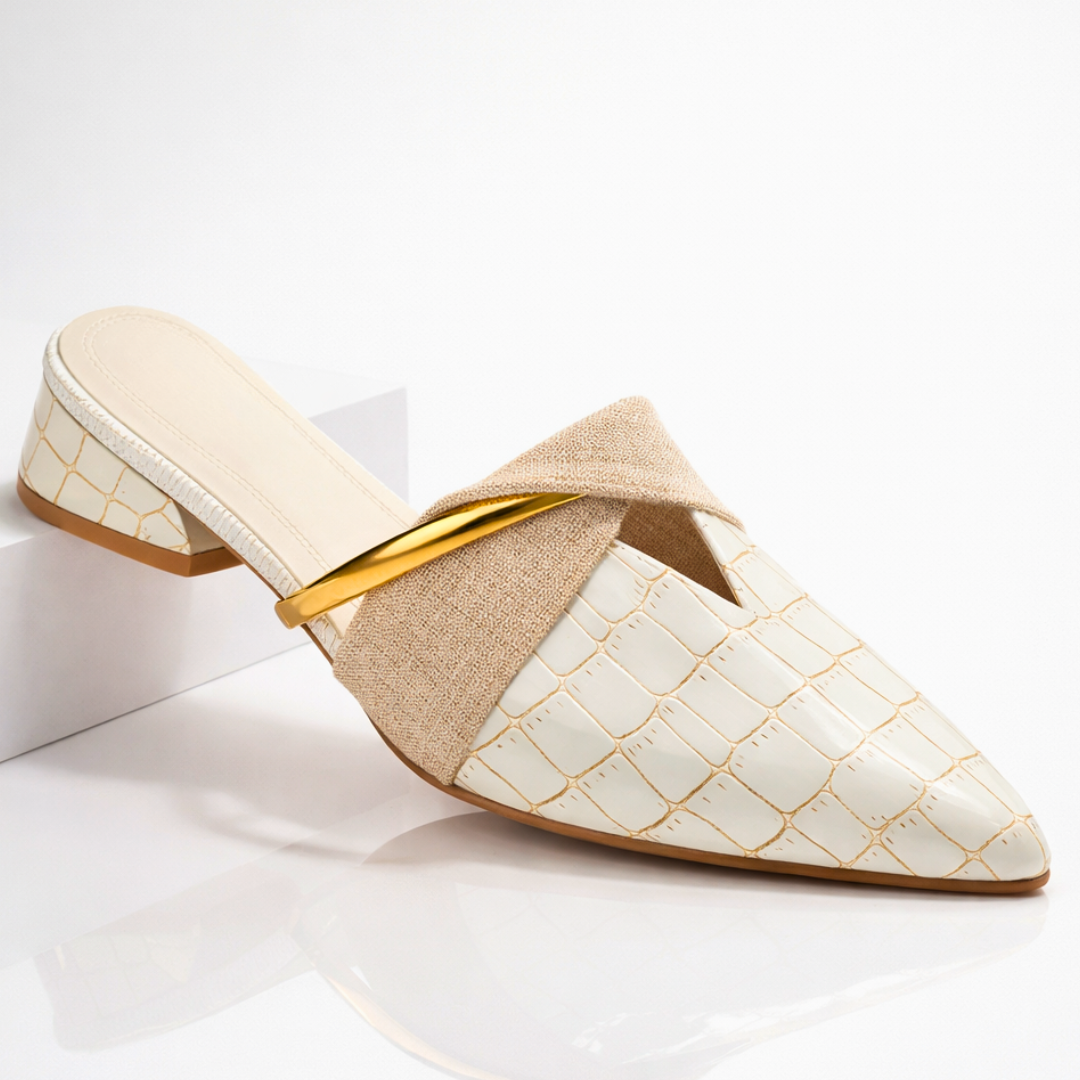 Cream gator-pattern slip-on mule with beige fabric strap and gold bar accent