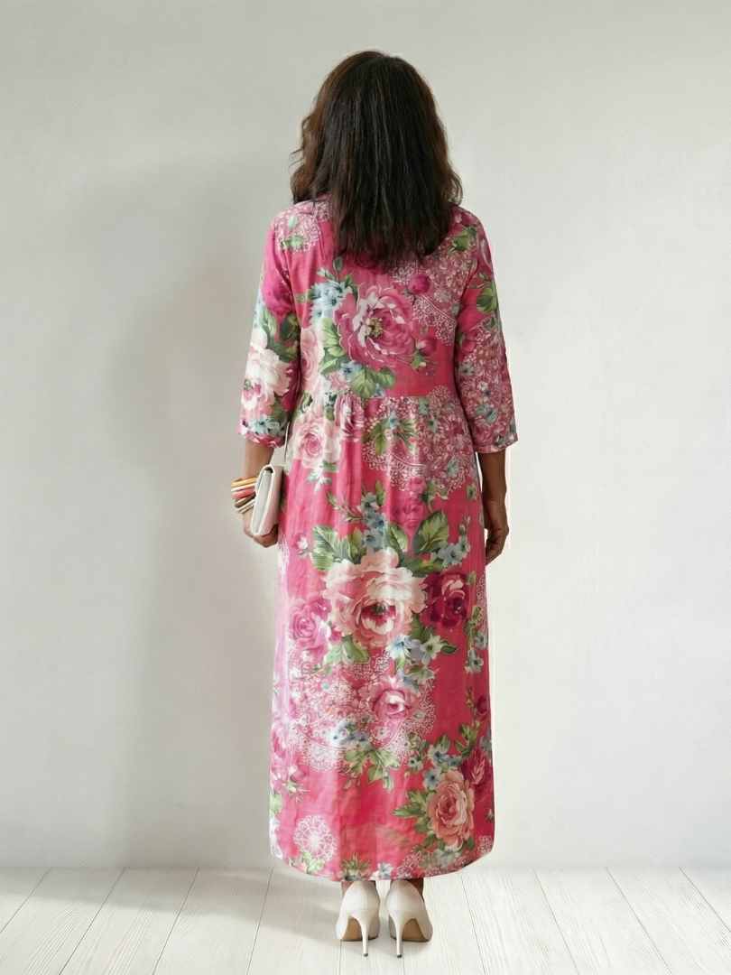 Pink floral midi dress, back view, three-quarter sleeves