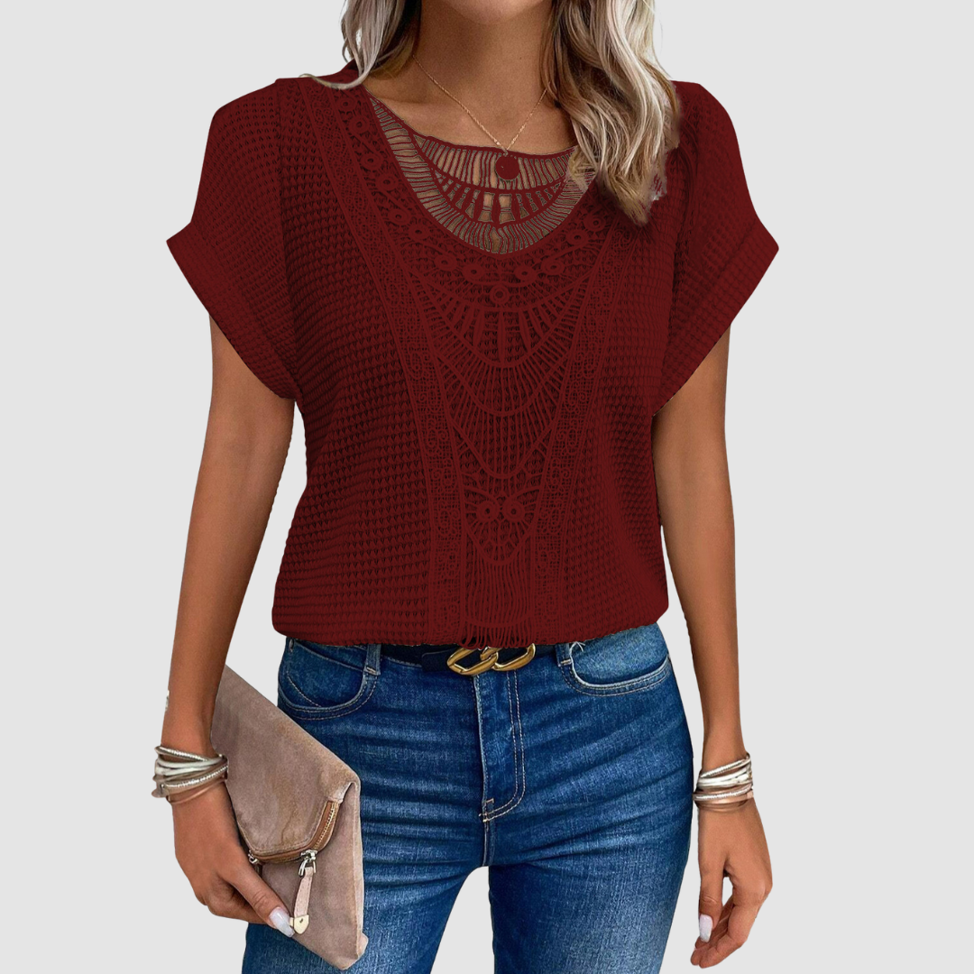 Red lace crochet top with ornate central motif and short batwing sleeves