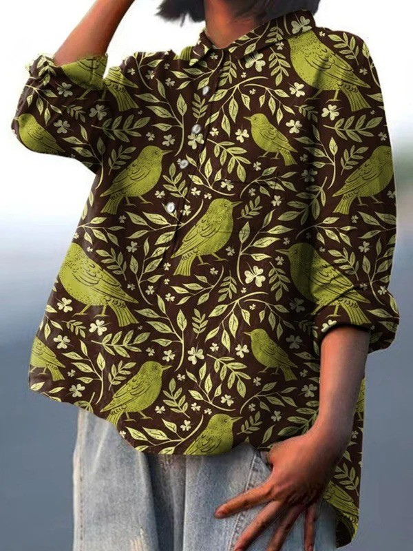 Women's bird-and-floral print button-up shirt with long sleeves and collar