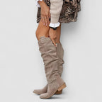 Beige orthopedic western boots with tall shaft, side zipper, and double snap ankle straps.