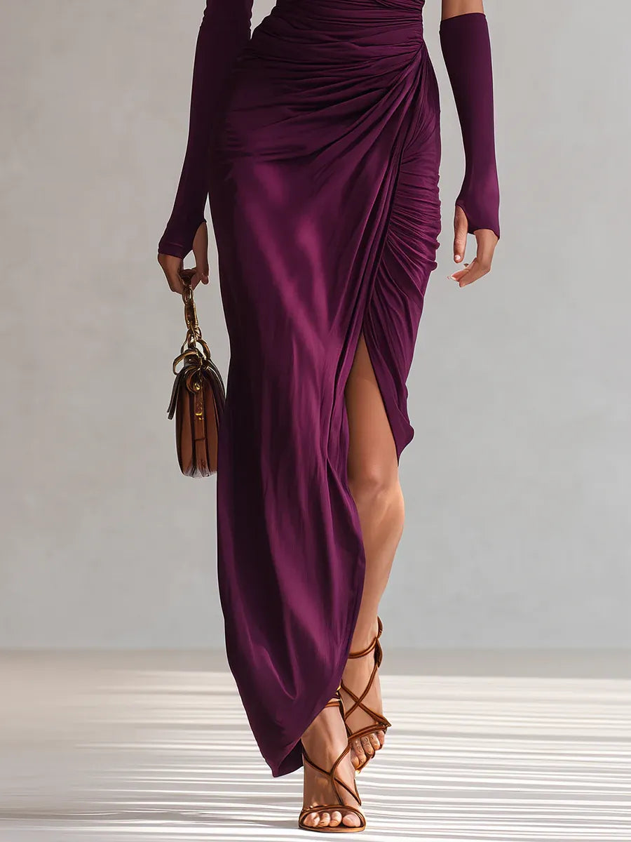 Purple one-shoulder maxi dress with long sleeve, ruched drape, and thigh-high slit
