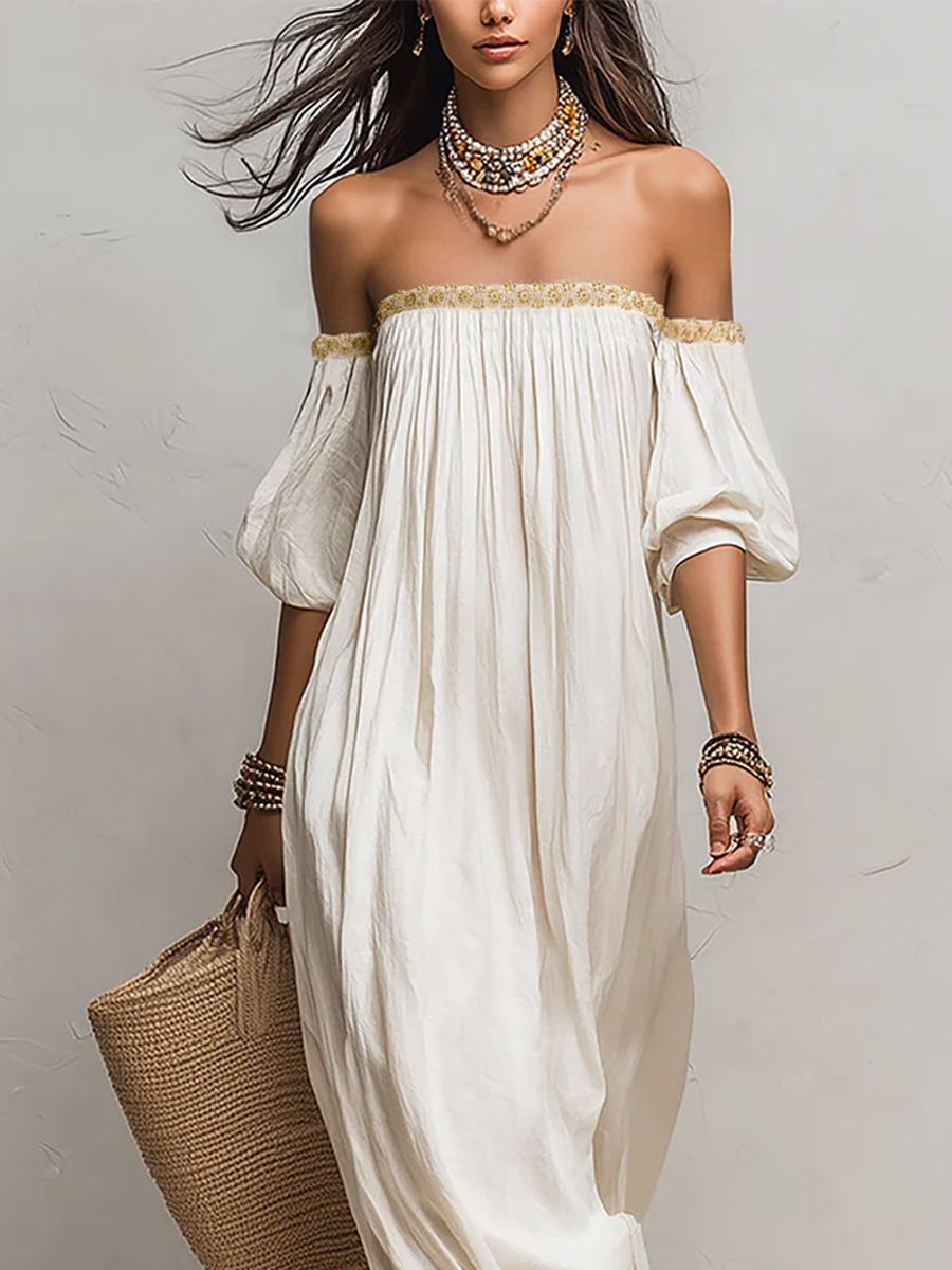 Ivory off-shoulder pleated maxi dress with decorative neckline and draped sleeves