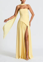 Strapless yellow maxi dress with gathered skirt and thigh slit